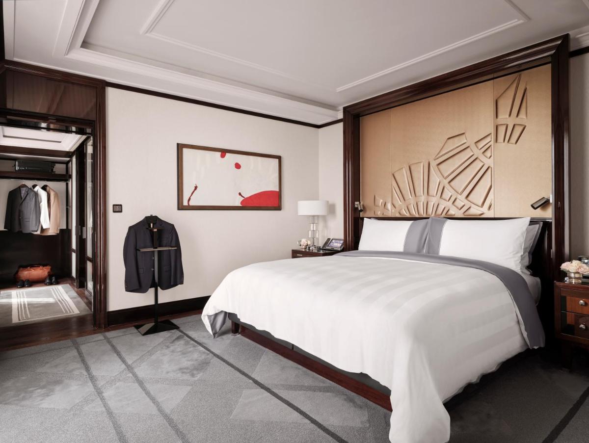 Un ou plusieurs lits dans un hébergement de l'établissement The Peninsula Paris
