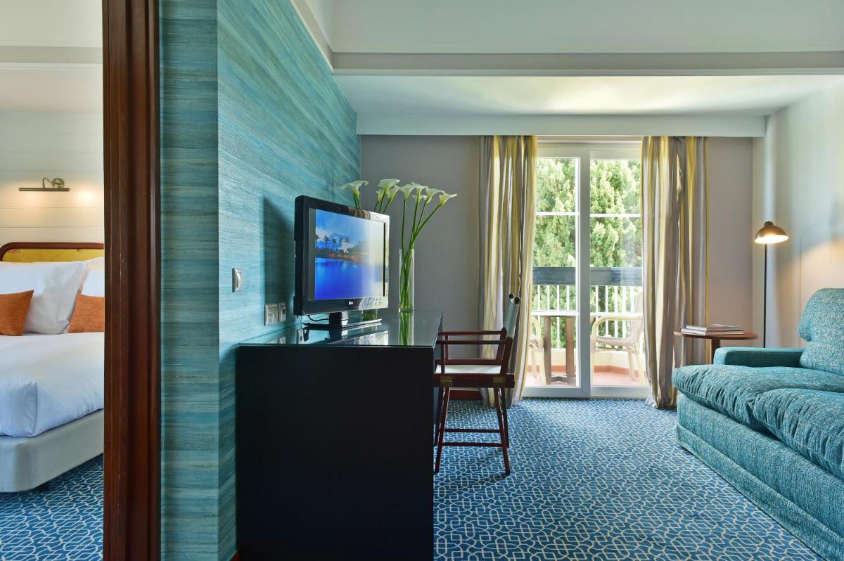 Uma cama ou camas num quarto em Pestana Alvor Praia Premium Beach & Golf Resort