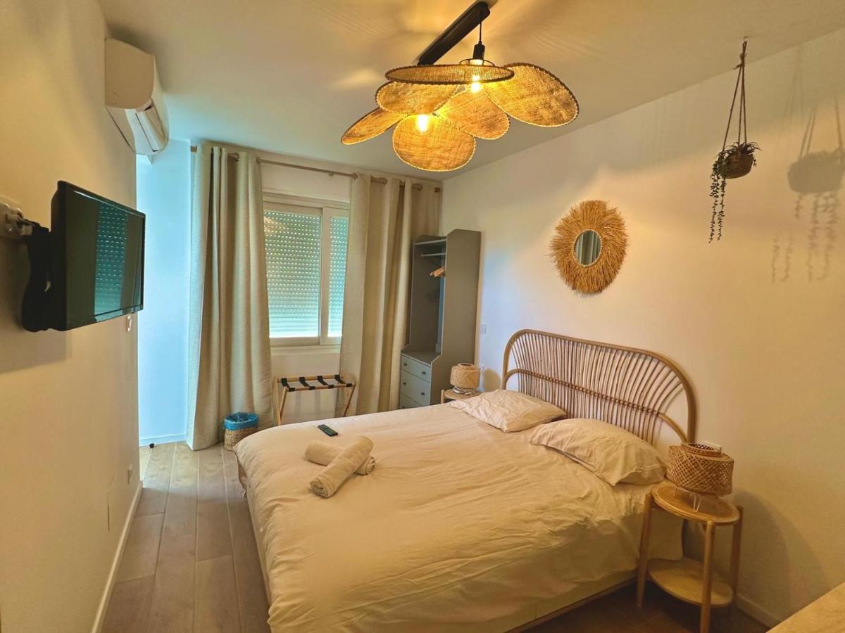 Suites Aronas-hébergements climatisés rive droite plein centre ville - Housity