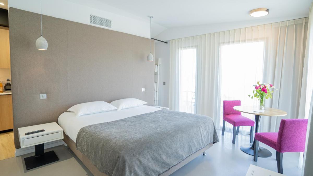 Un ou plusieurs lits dans un hébergement de l'établissement Les Villas du Parc de la Chabotterie