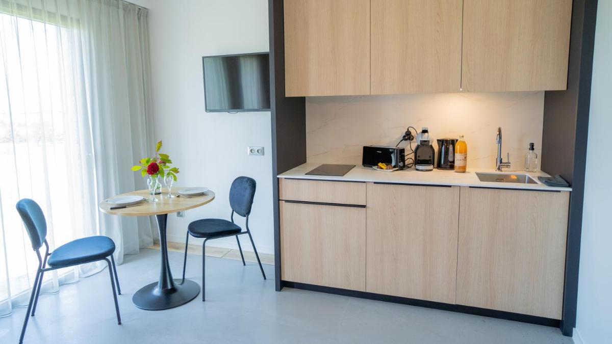 Cuisine ou kitchenette dans l'établissement Les Villas du Parc de la Chabotterie
