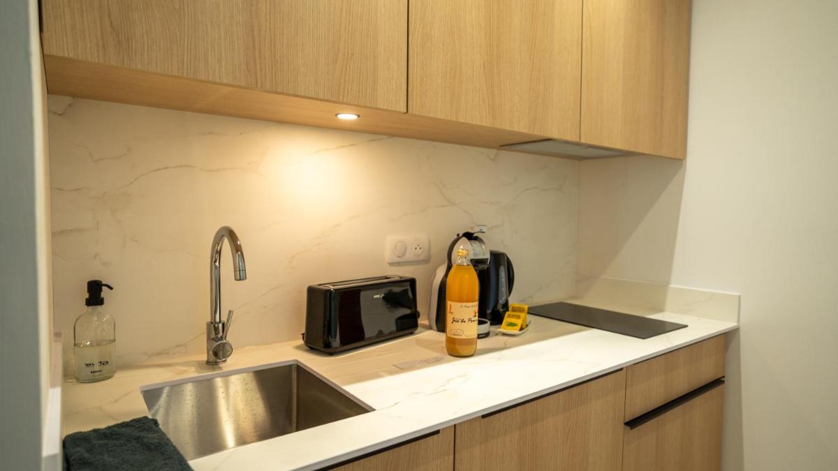 Cuisine ou kitchenette dans l'établissement Les Villas du Parc de la Chabotterie