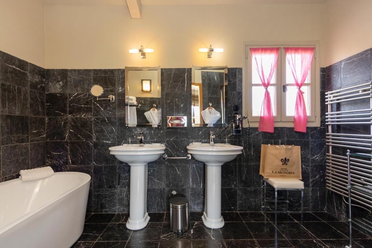 Salle de bains dans l'établissement La Signoria & Spa