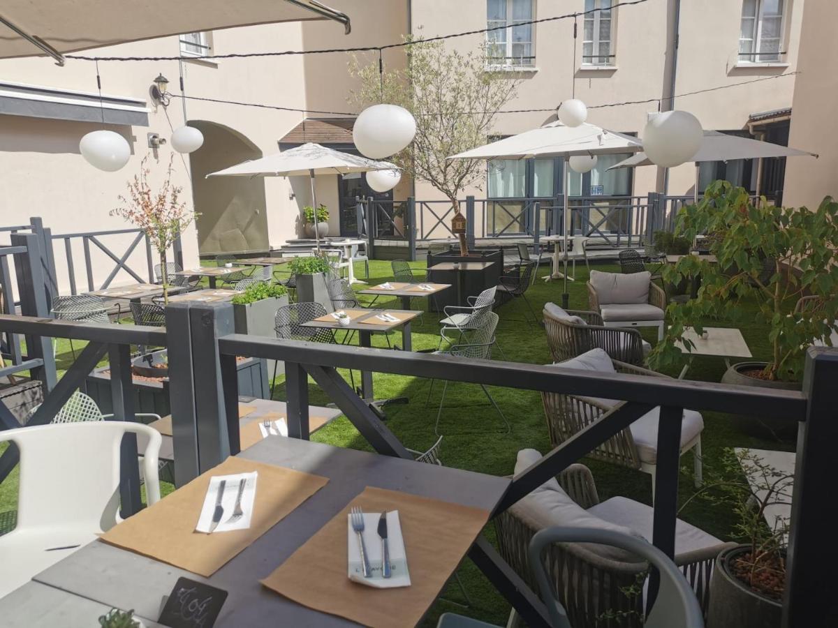 Restaurant ou autre lieu de restauration dans l'établissement Hotel Normandy