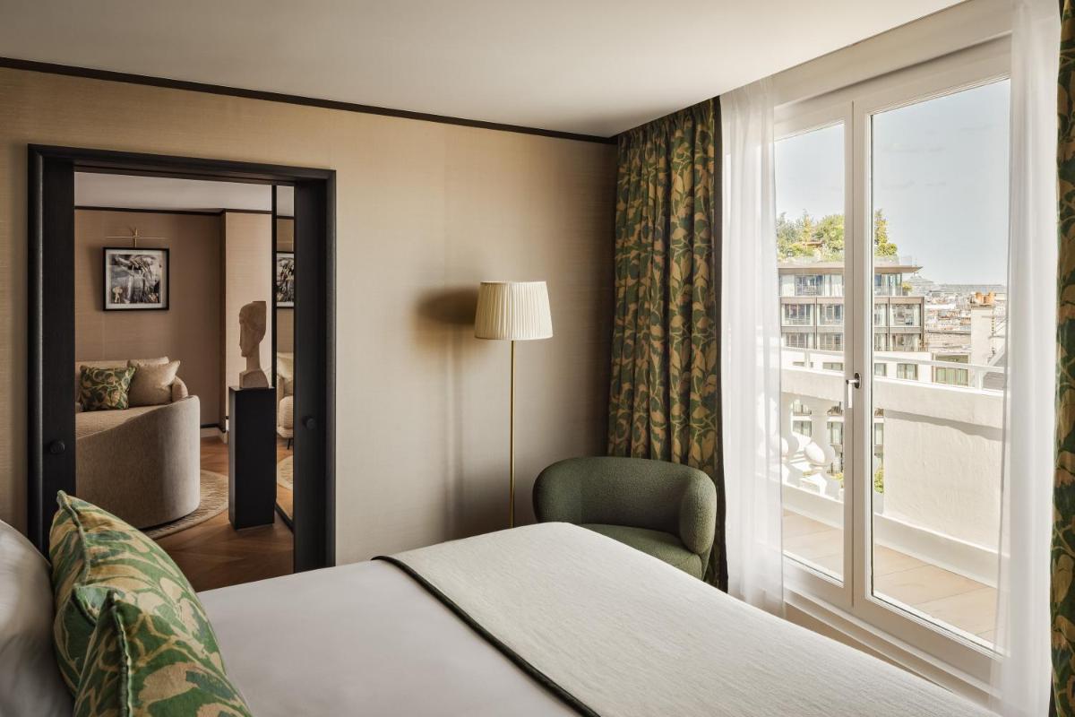 Un ou plusieurs lits dans un hébergement de l'établissement Hôtel De Sers Champs Elysées Paris