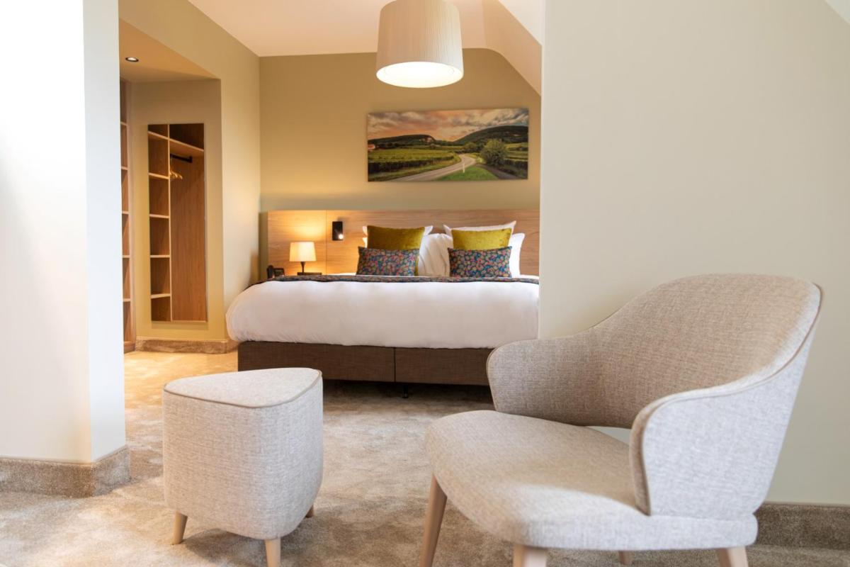 Coin salon dans l'établissement Hôtel Terra Vinum