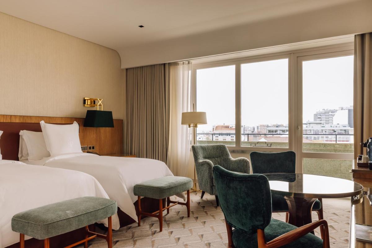 Uma cama ou camas num quarto em Four Seasons Hotel Ritz Lisbon