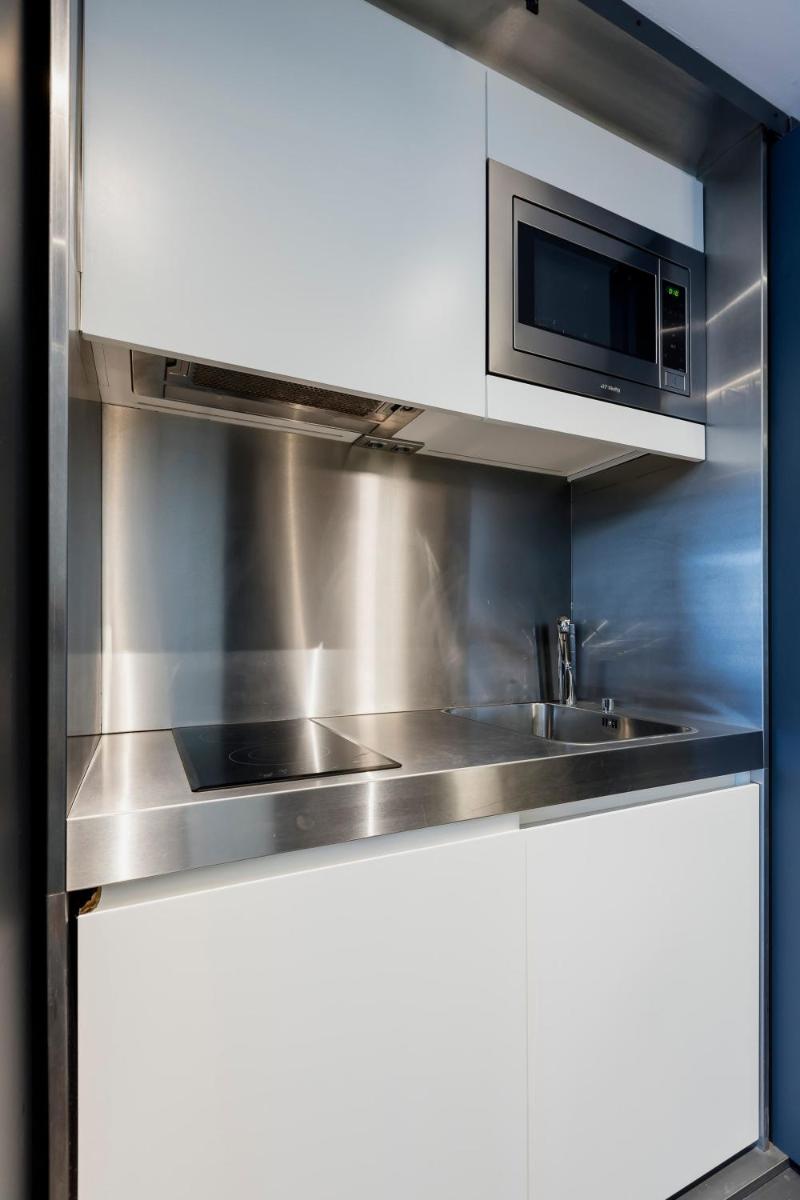 A cozinha ou kitchenette de Troia Design Hotel
