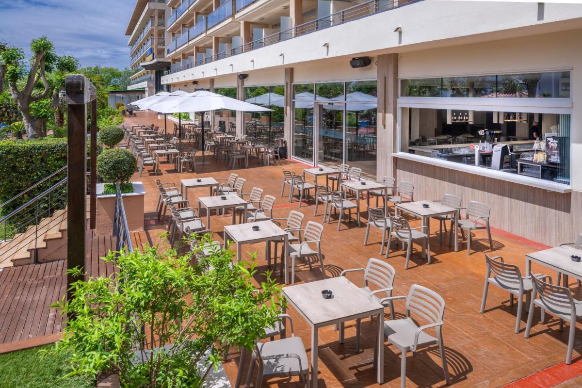 Un restaurante o sitio para comer en 4R Gran Regina