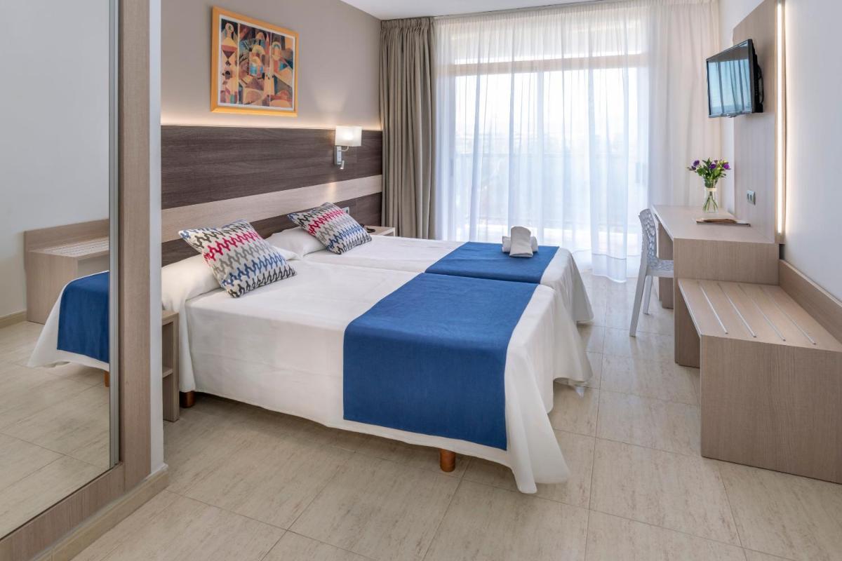 Cama o camas de una habitación en 4R Gran Regina