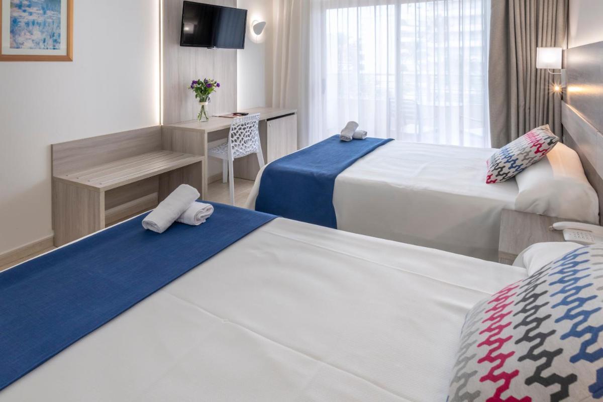 Cama o camas de una habitación en 4R Gran Regina