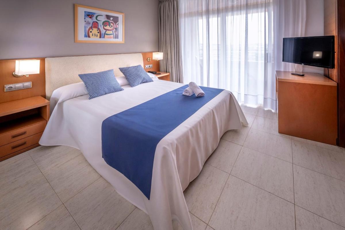 Cama o camas de una habitación en 4R Gran Regina