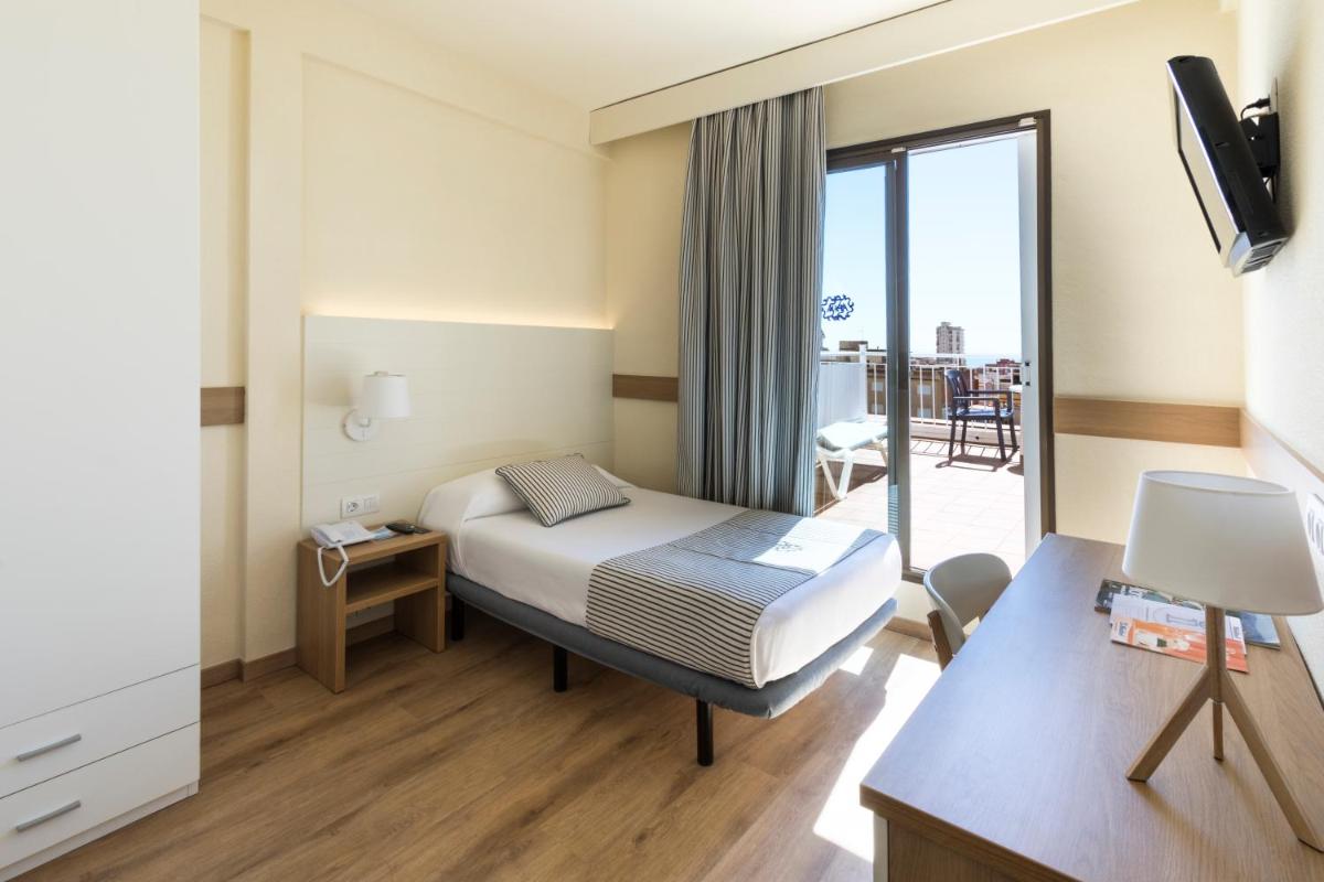 Cama o camas de una habitación en Hotel Anabel