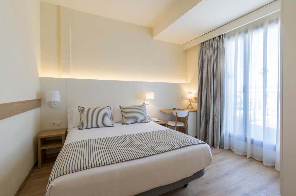 Cama o camas de una habitación en Hotel Anabel