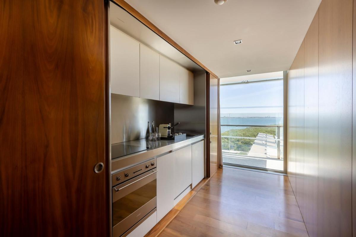 A cozinha ou kitchenette de Troia Design Hotel