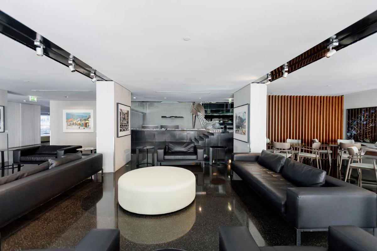 Uma área de estar em Troia Design Hotel