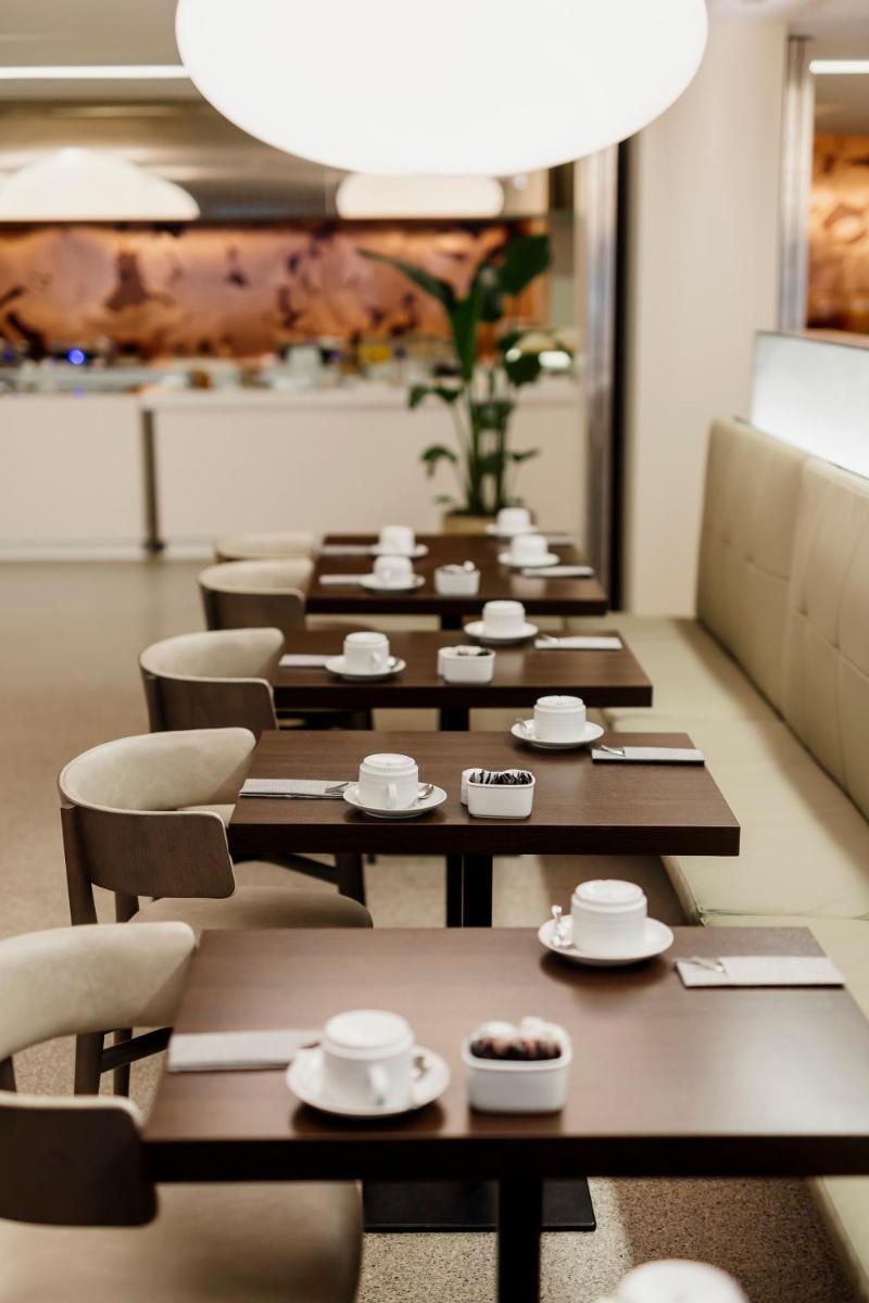 Uma área de estar em Troia Design Hotel