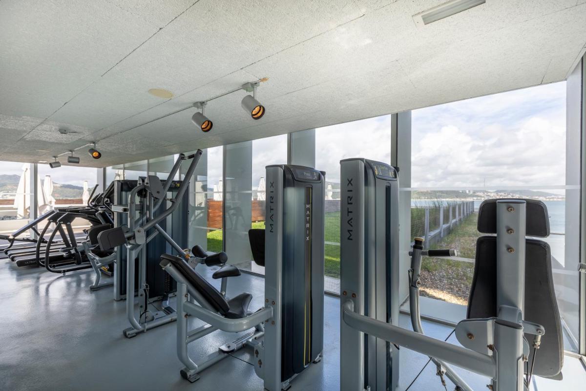 O centro de fitness e/ou as comodidades de fitness de Troia Design Hotel