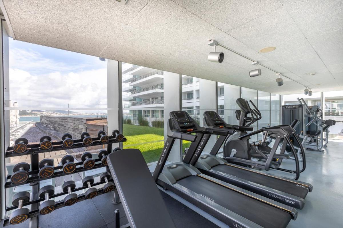 O centro de fitness e/ou as comodidades de fitness de Troia Design Hotel