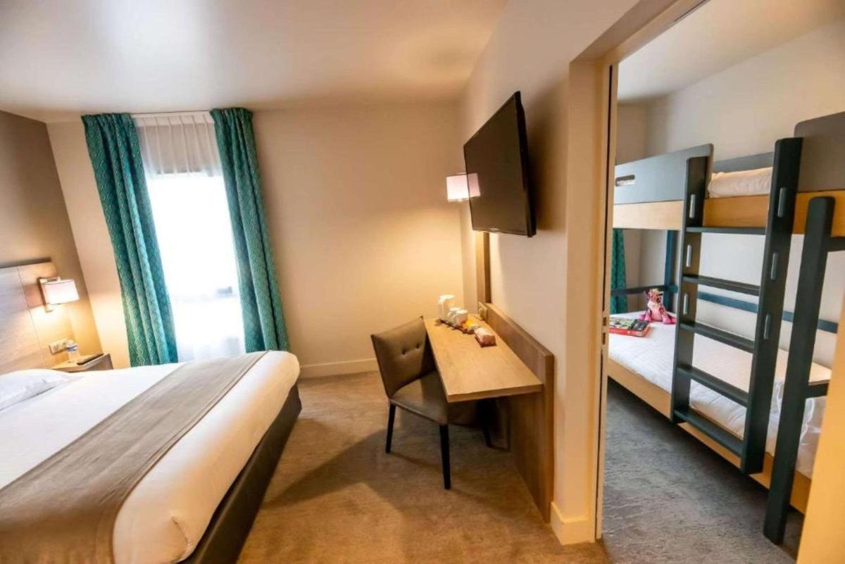 Un ou plusieurs lits dans un hébergement de l'établissement Best Western Eden SPA
