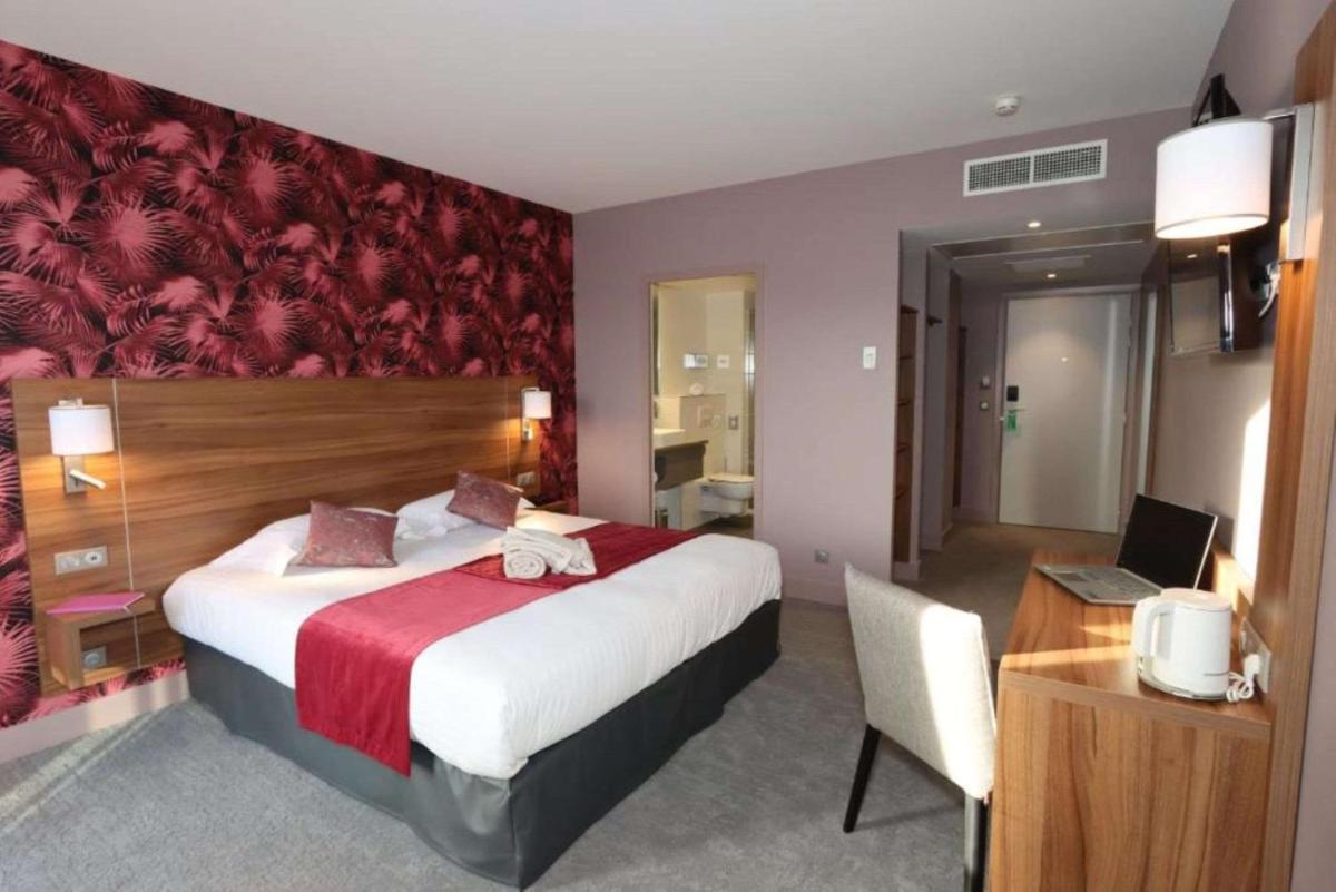 Un ou plusieurs lits dans un hébergement de l'établissement Best Western Eden SPA