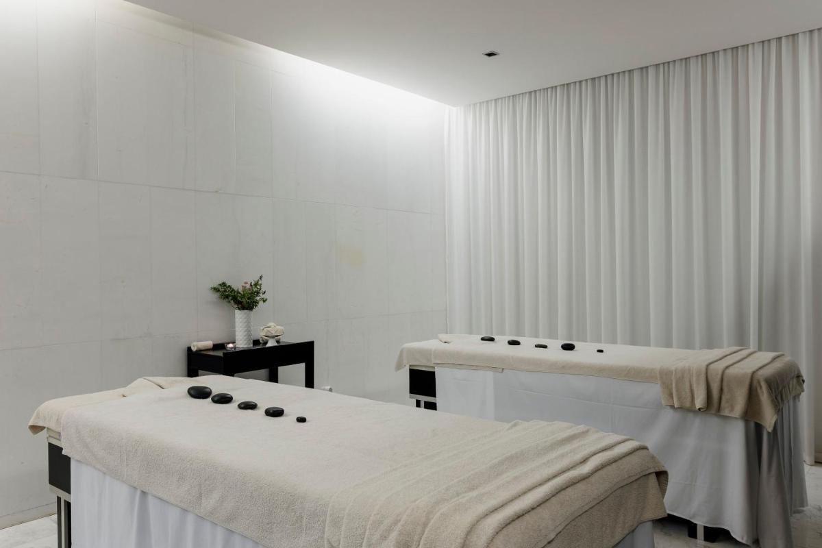O spa e/ou outras comodidades de bem-estar em Troia Design Hotel