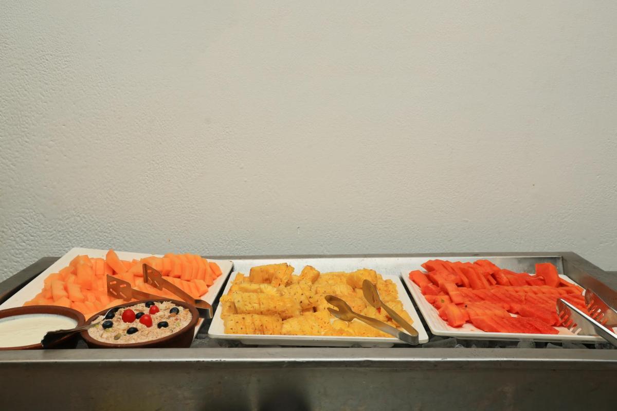 a tray filled with different types of vegetables and dip at Le Royal Meridien Chennai in Chennai