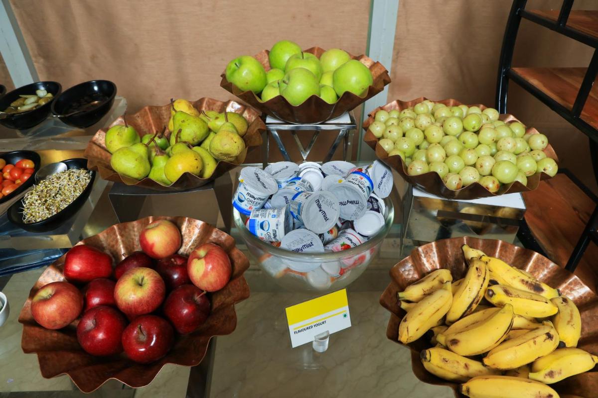 a display of different types of fruits and vegetables at Le Royal Meridien Chennai in Chennai