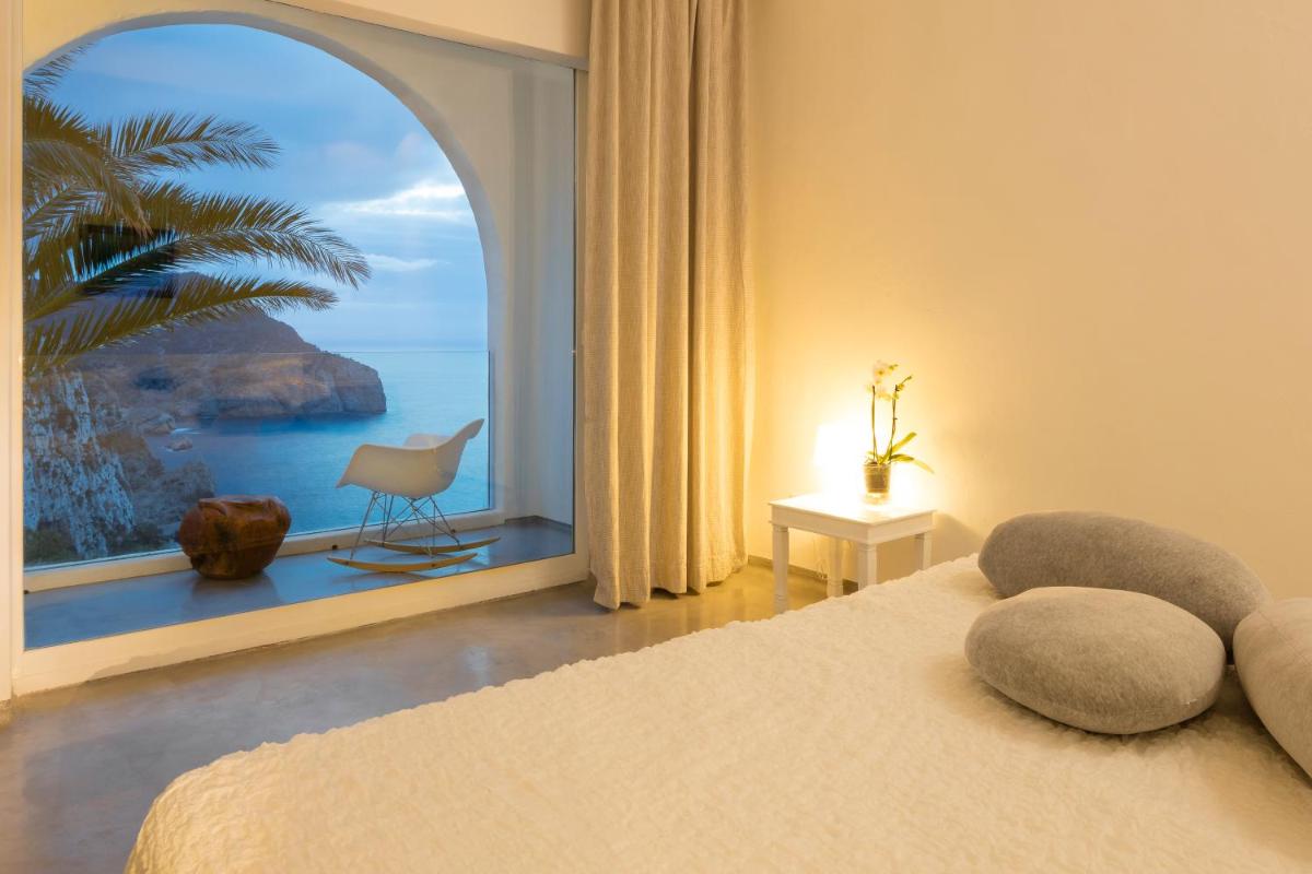 Cama o camas de una habitación en Hacienda Na Xamena, Ibiza