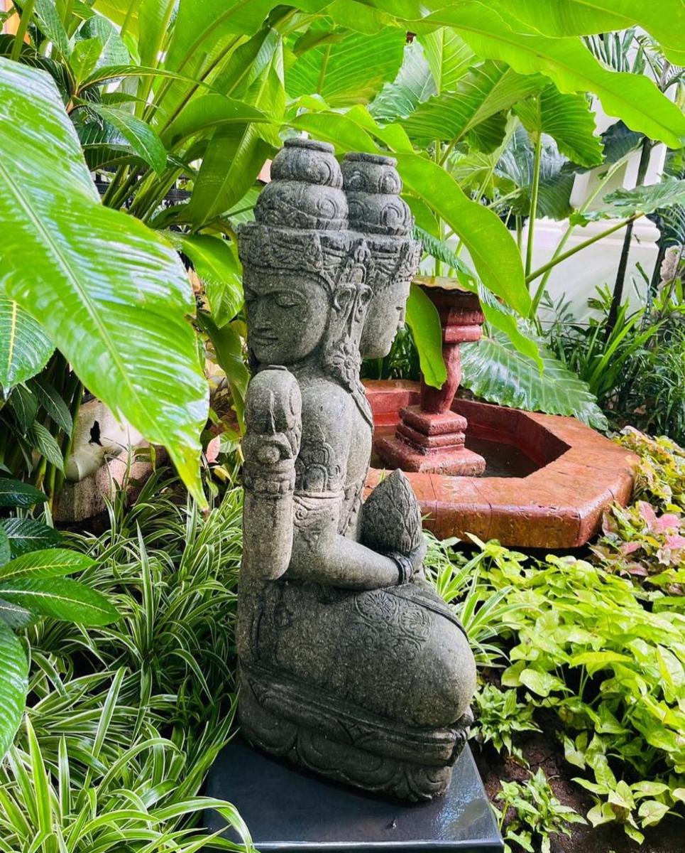 a statue of aitatingitatingitatingitatingitatingitatingitatingitatingitatingitatingitatingfficient at The Postcard Saligao in Calangute