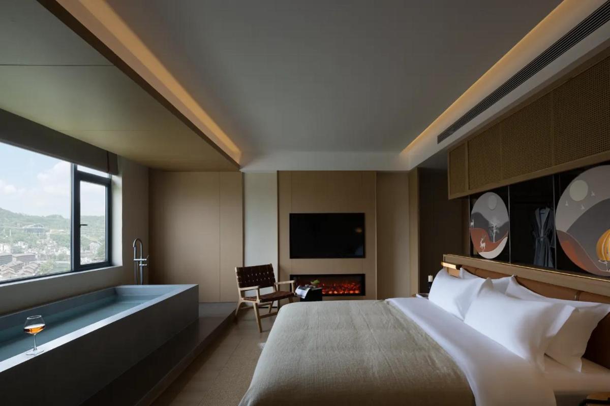 Yanyu Yunxi Resort Hotel烟雨云兮酒店 - Hizvo