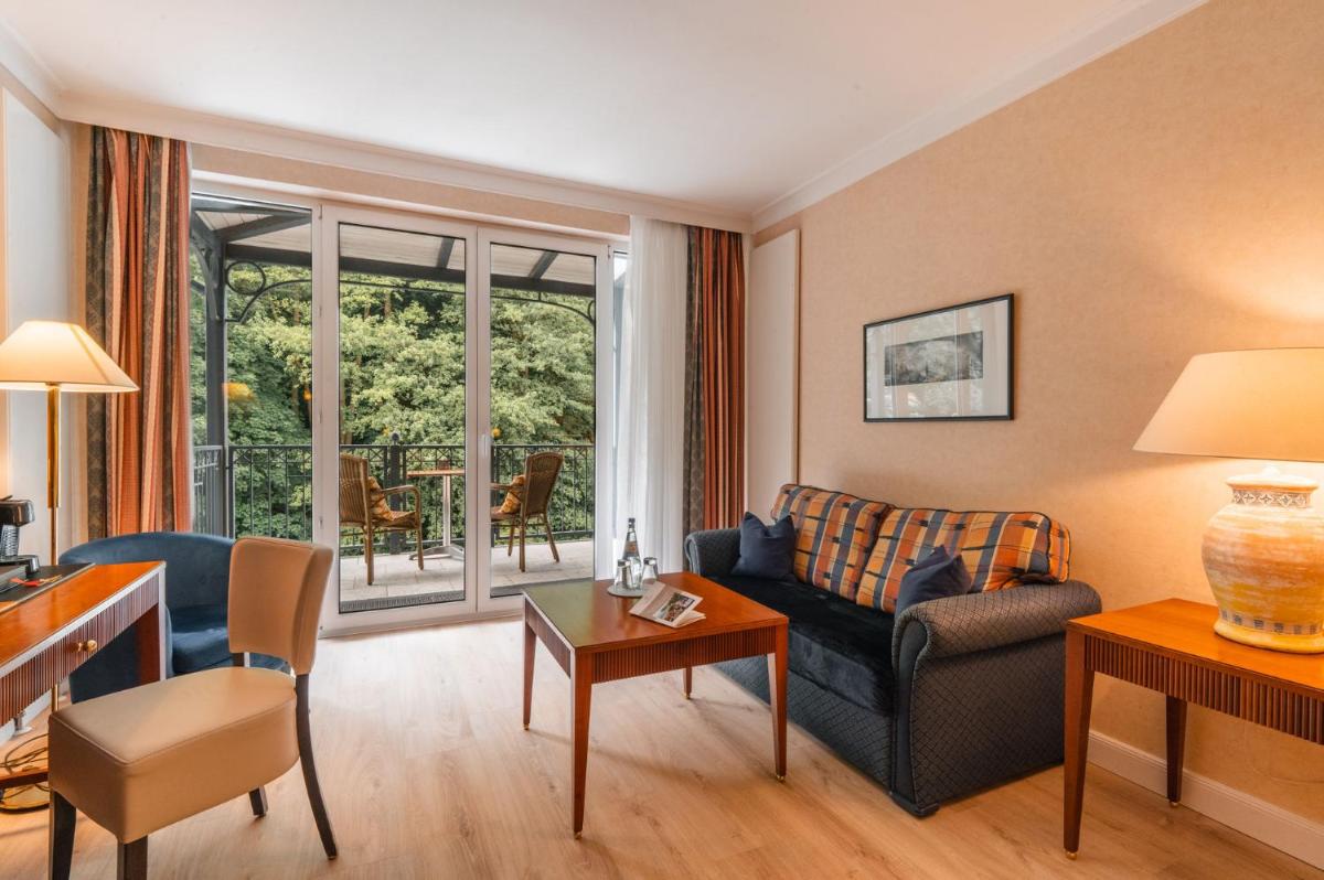 Ein Sitzbereich in der Unterkunft Grand Hotel Binz