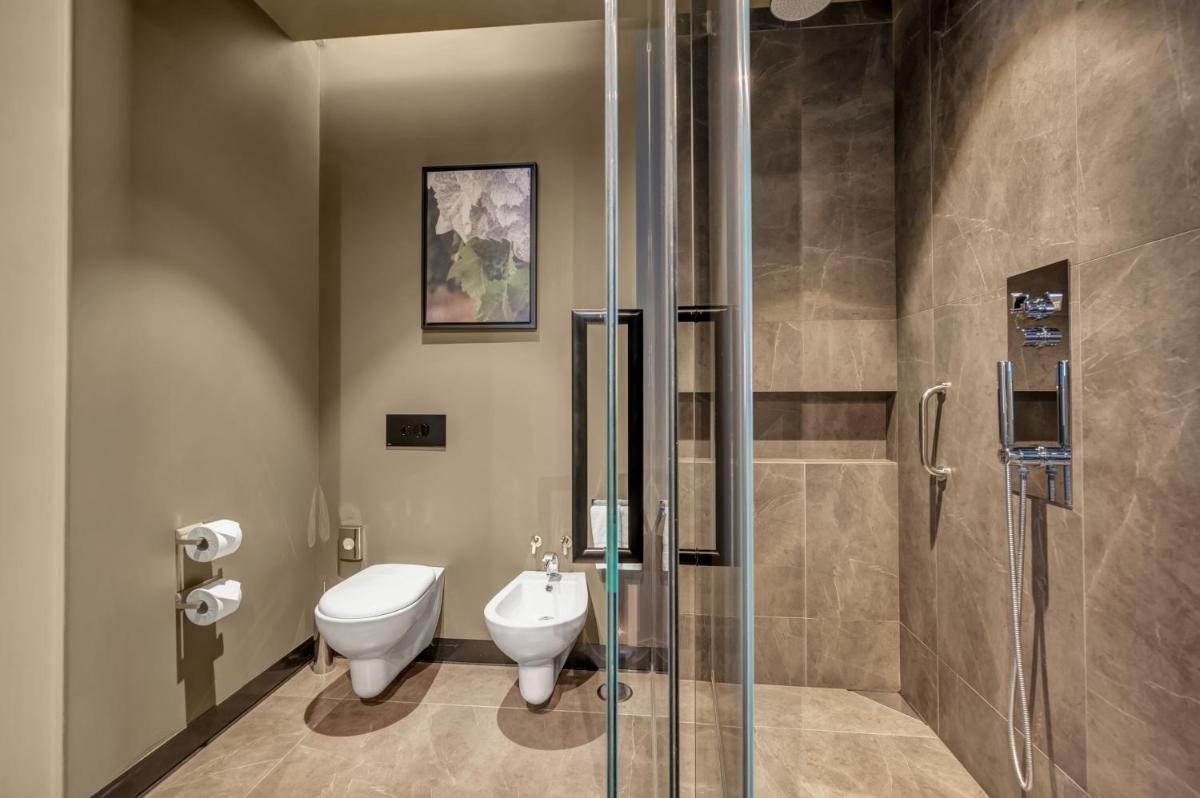 Uma casa de banho em Hilton Porto Gaia