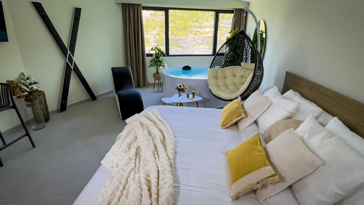 Cama o camas de una habitación en Hotel Spa Mirador