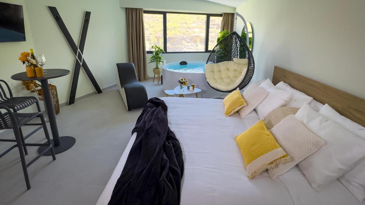 Cama o camas de una habitación en Hotel Spa Mirador