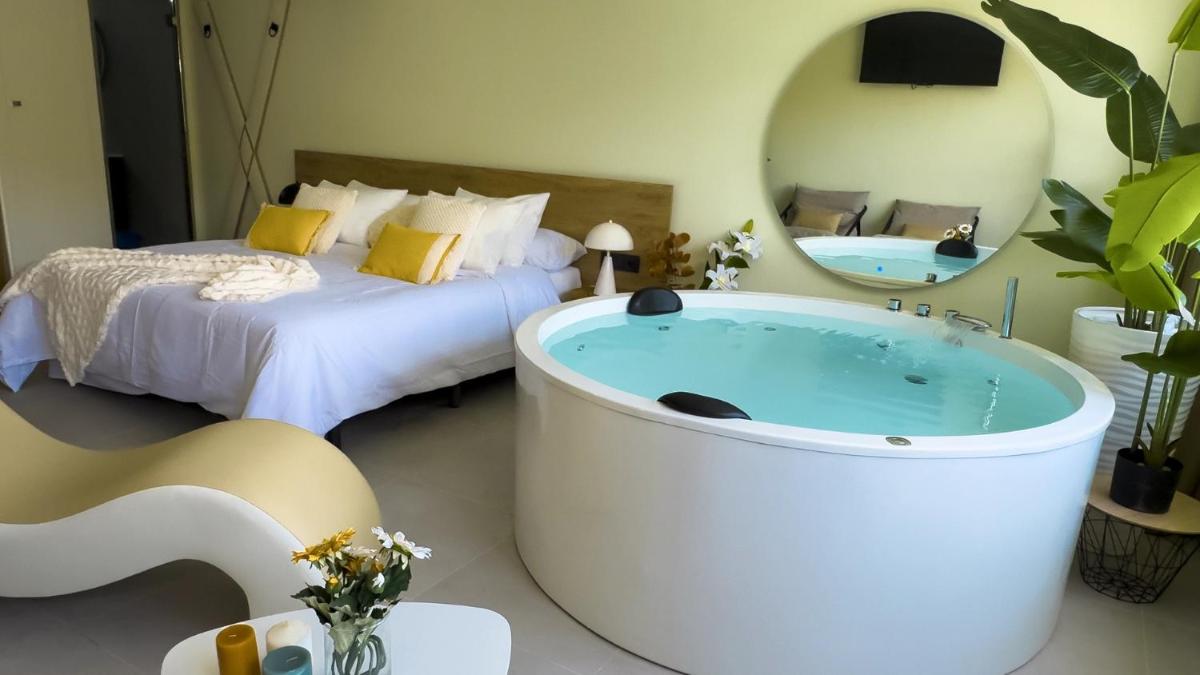 Cama o camas de una habitación en Hotel Spa Mirador