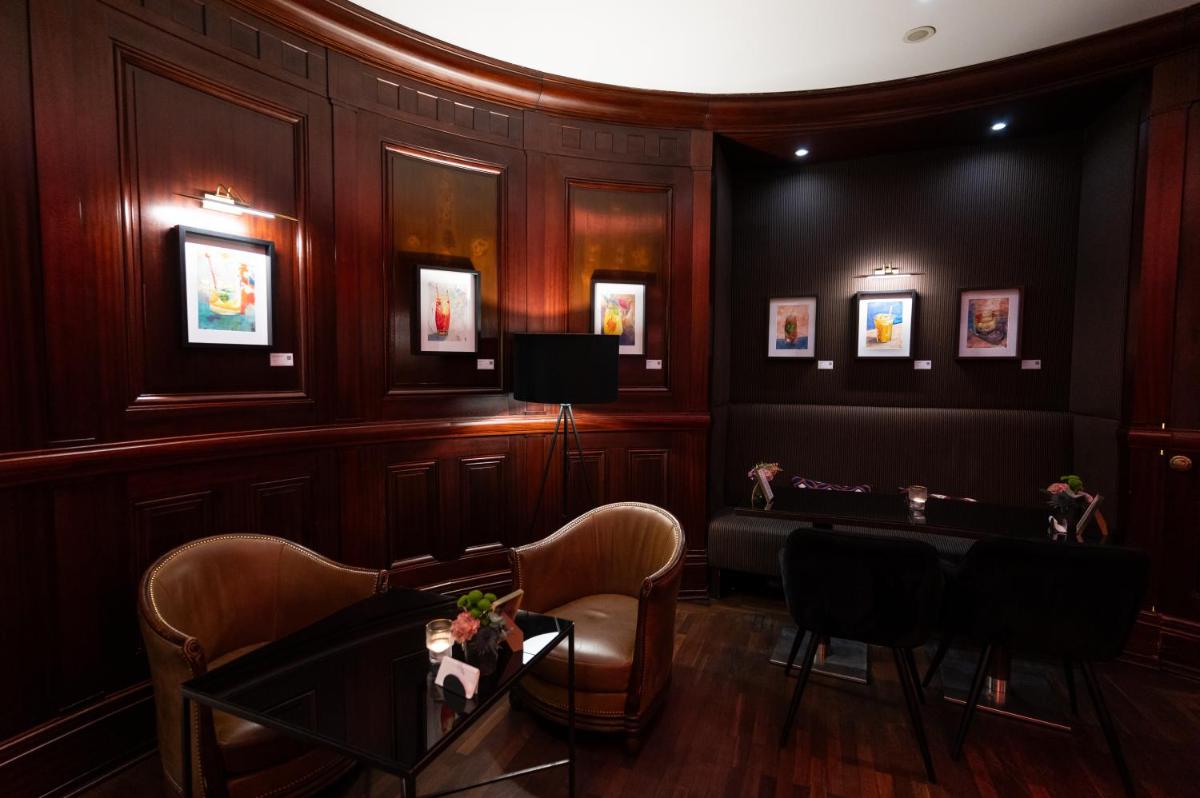 Coin salon dans l'établissement Hôtel Pont Royal Paris