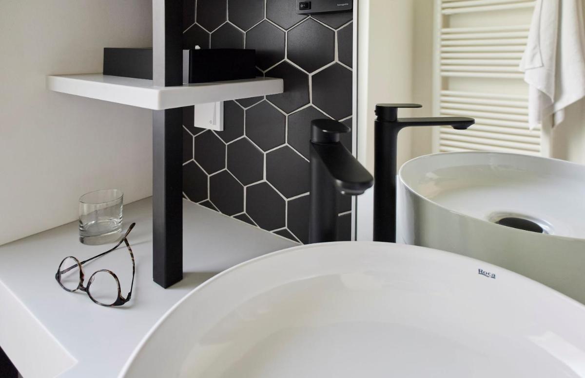 Uma cama ou camas num quarto em ROBINSON QUINTA DA RIA - All Inclusive
