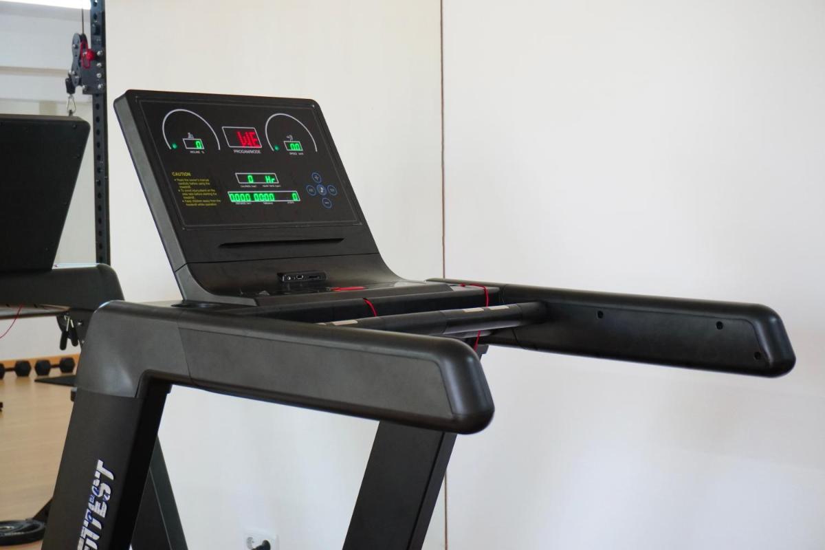 O centro de fitness e/ou as comodidades de fitness de Clube Porto Mos - Sunplace Hotels & Beach Resort