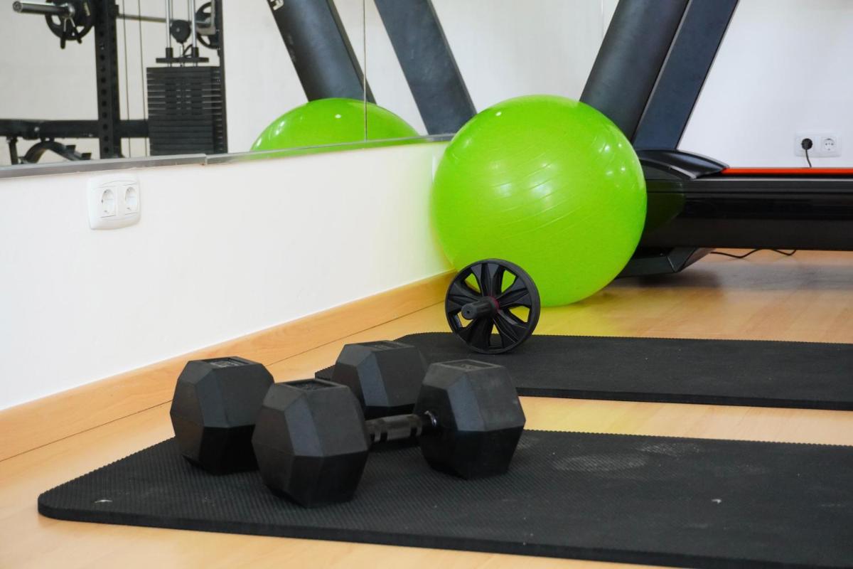 O centro de fitness e/ou as comodidades de fitness de Clube Porto Mos - Sunplace Hotels & Beach Resort