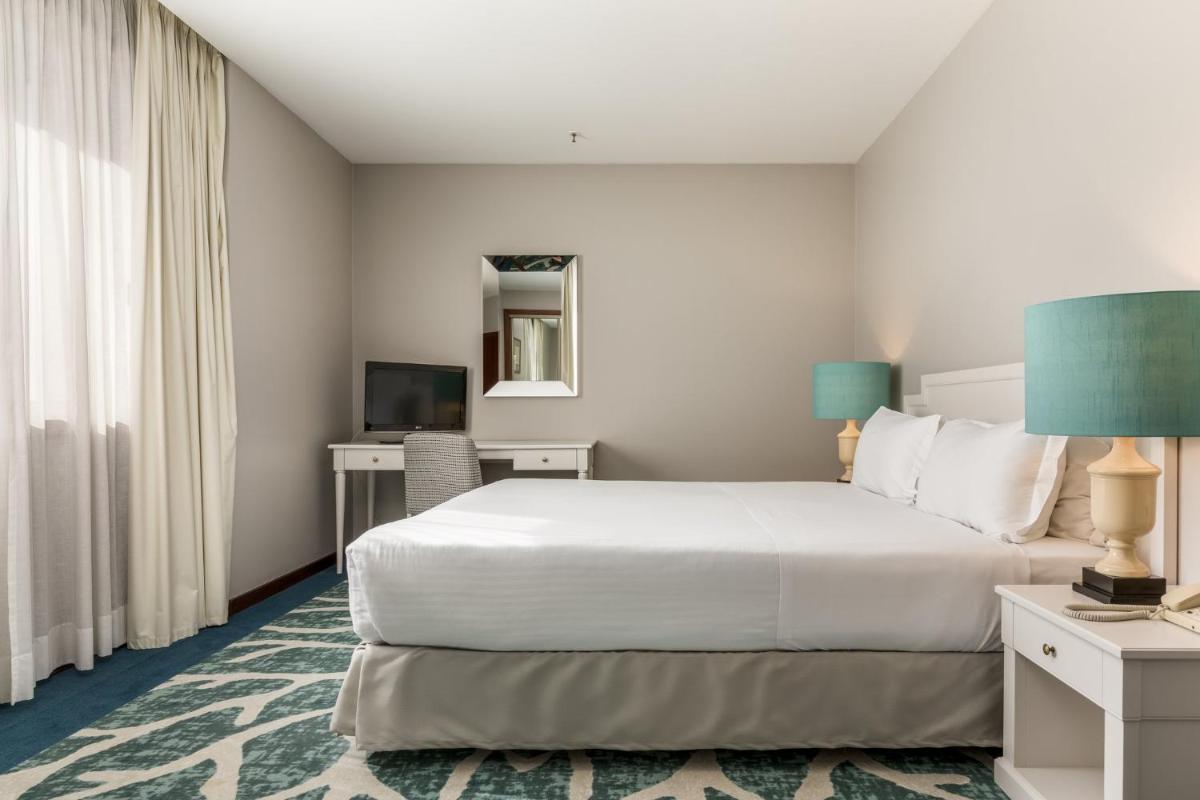 Uma cama ou camas num quarto em Holiday Inn Porto Gaia by IHG