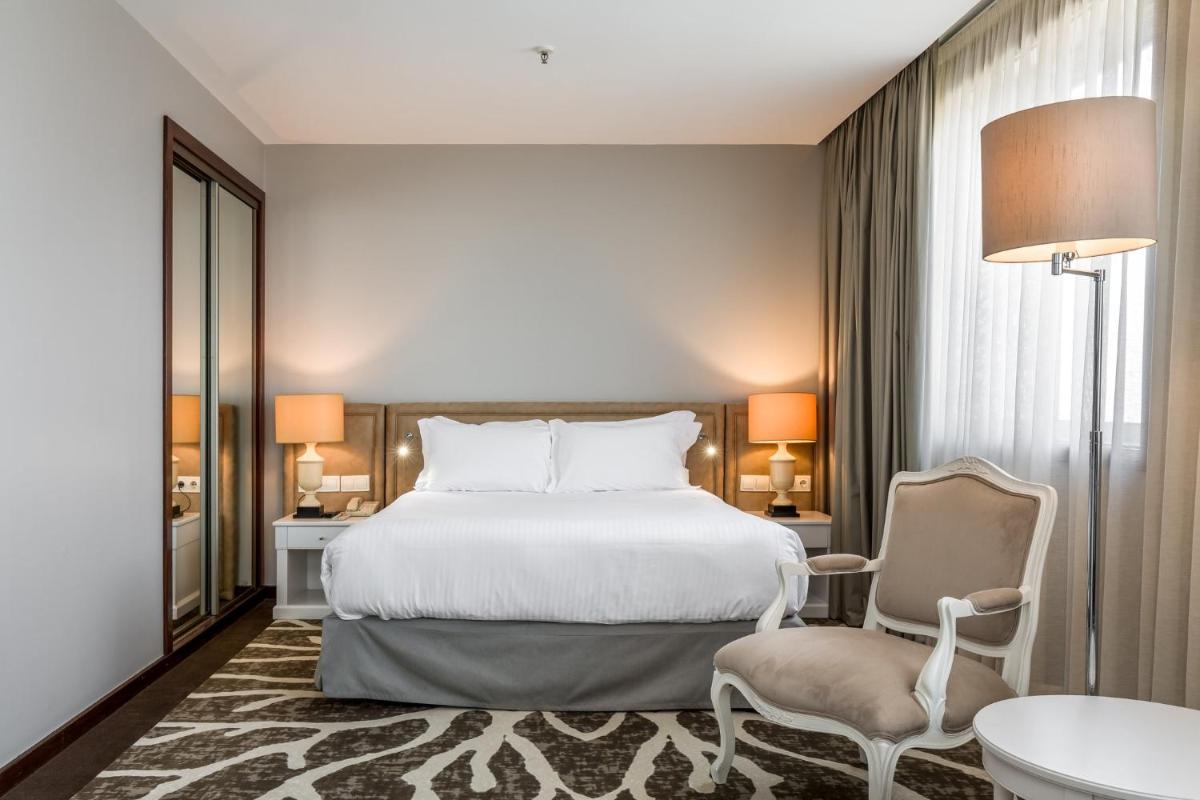 Uma cama ou camas num quarto em Holiday Inn Porto Gaia by IHG