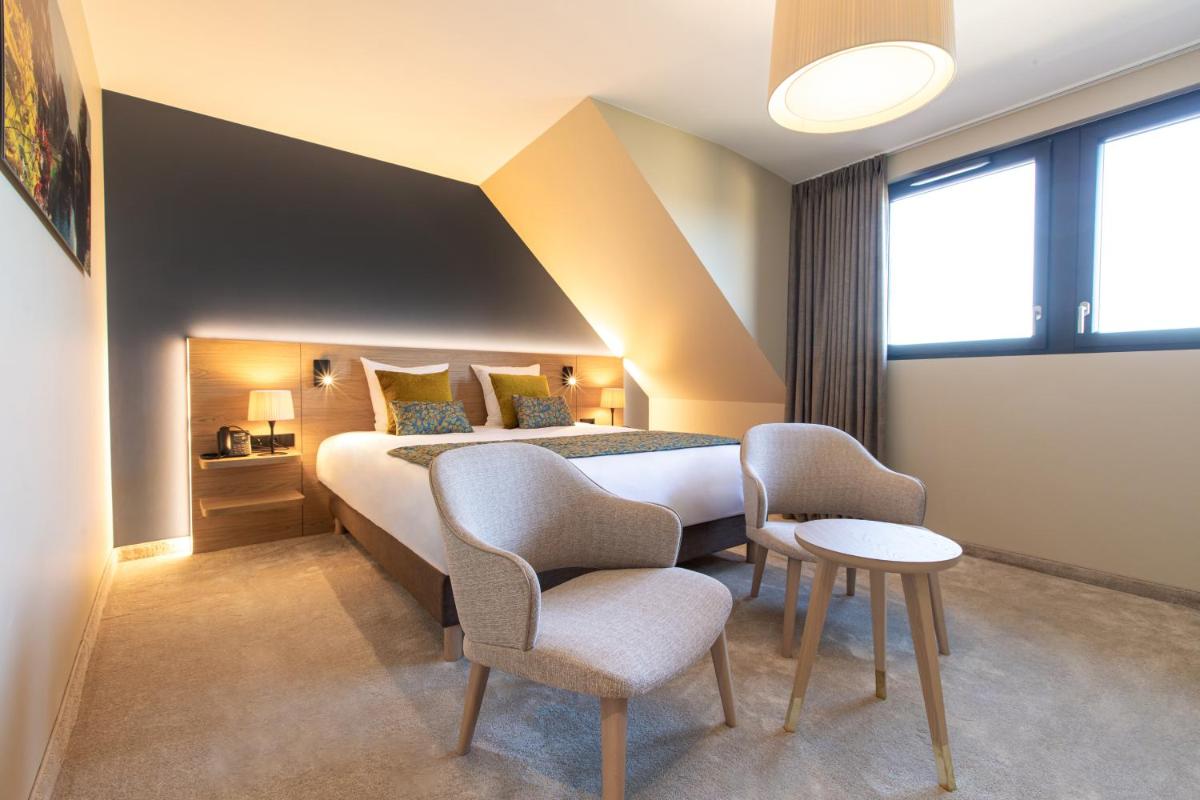 Coin salon dans l'établissement Hôtel Terra Vinum
