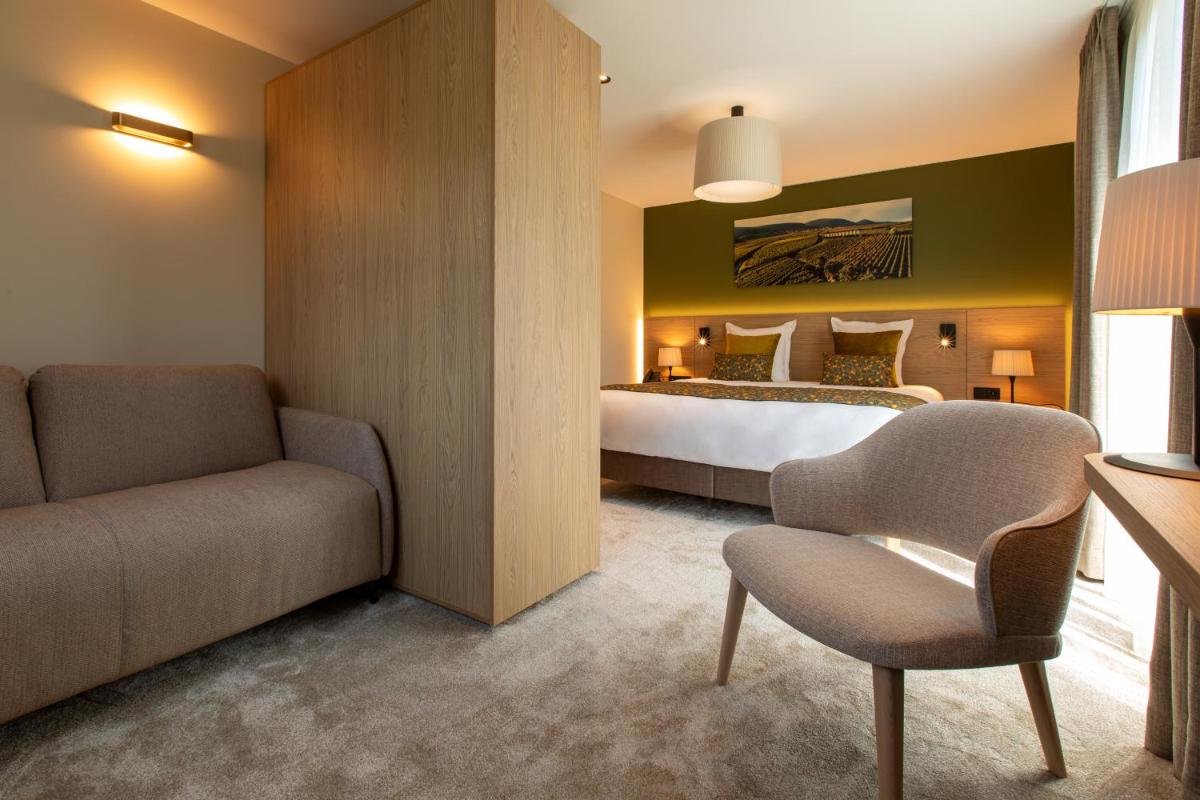 Coin salon dans l'établissement Hôtel Terra Vinum