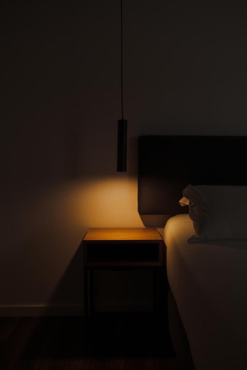 Uma cama ou camas num quarto em Monte Prado Hotel & Spa
