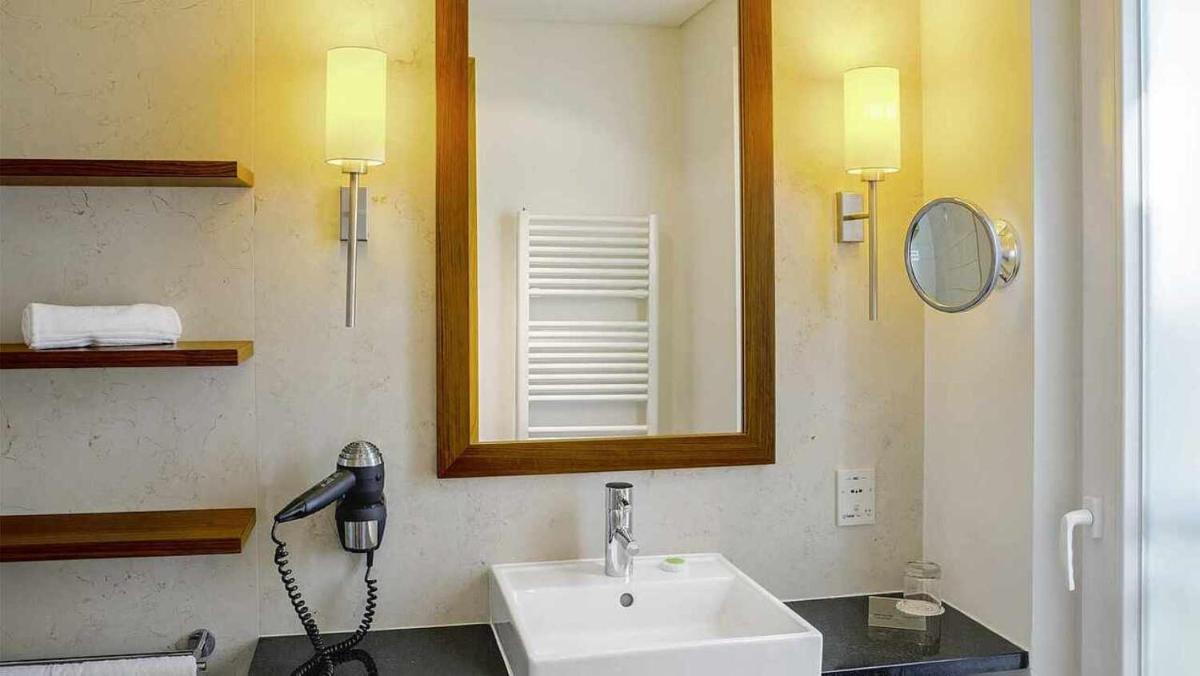 Uma casa de banho em ROBINSON QUINTA DA RIA - All Inclusive