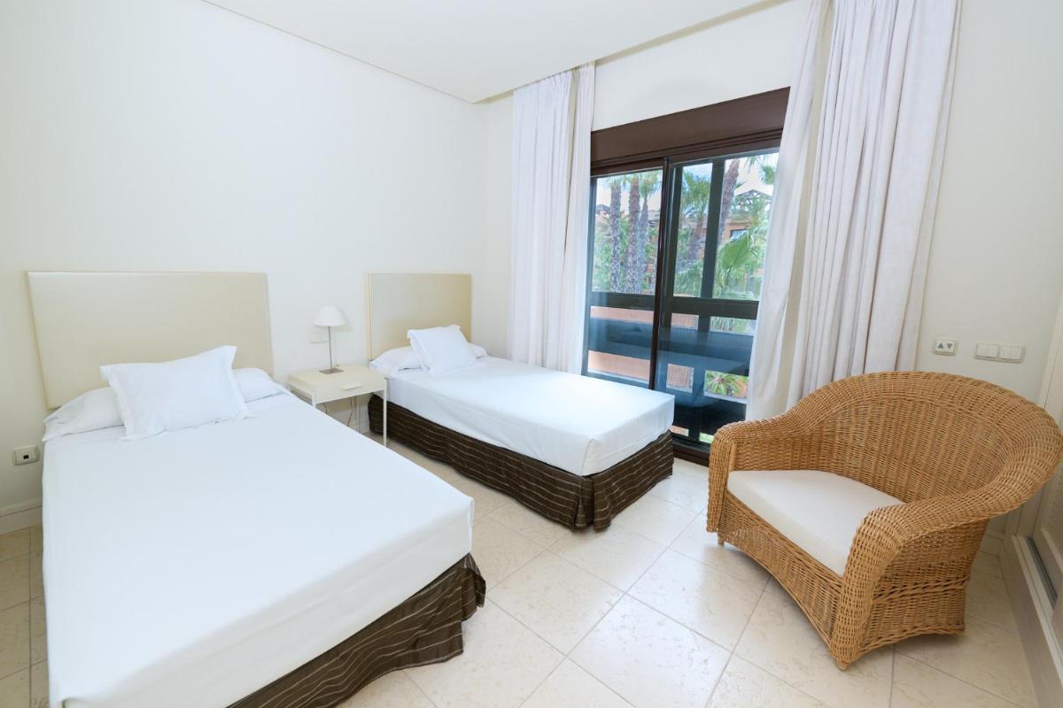 Cama o camas de una habitación en Aparthotel Novo Resort