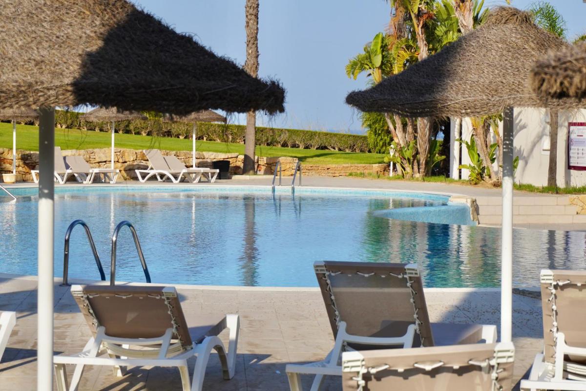 A piscina em ou perto de Clube Porto Mos - Sunplace Hotels & Beach Resort