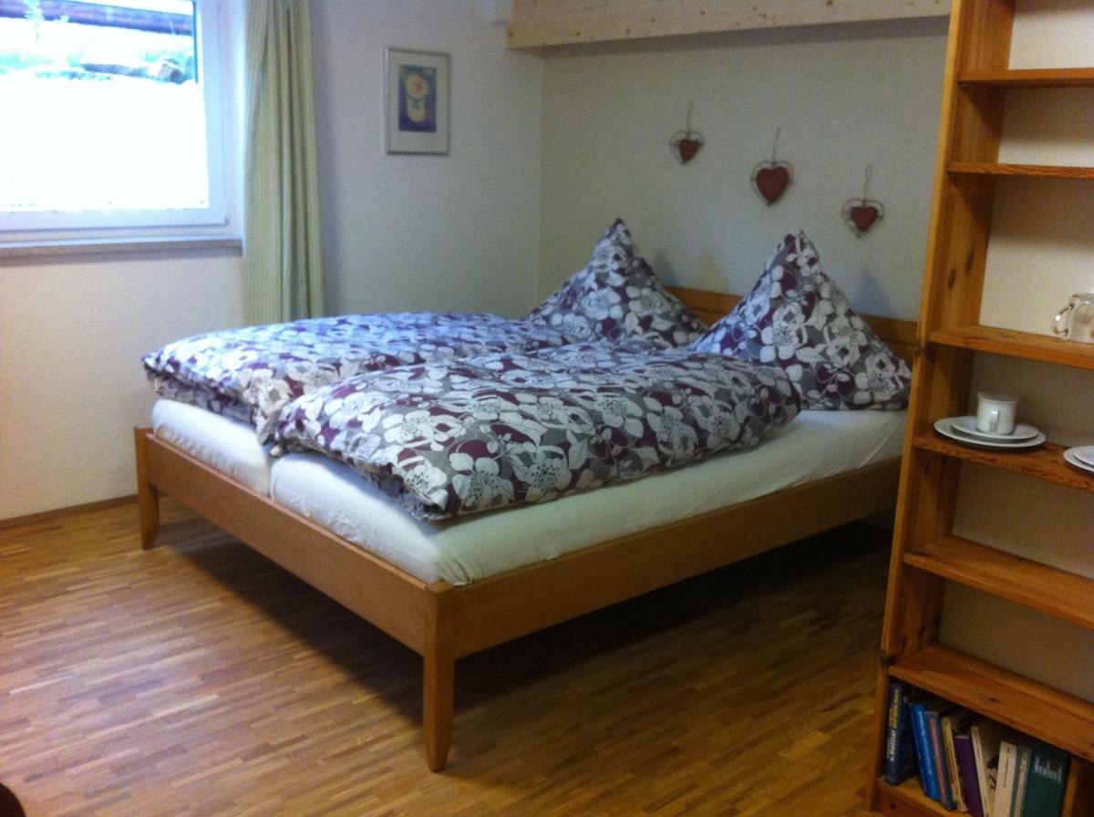 Ein Bett oder Betten in einem Zimmer der Unterkunft Haus am Waldpark