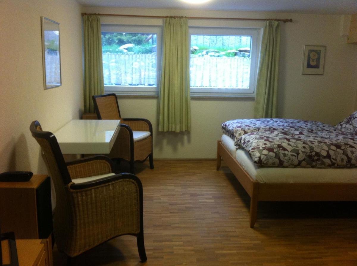 Ein Bett oder Betten in einem Zimmer der Unterkunft Haus am Waldpark